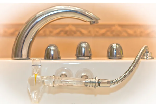 Water faucet with handles and shower