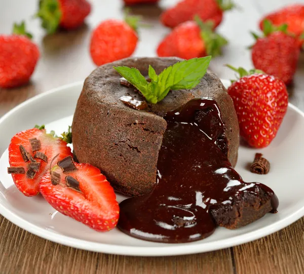 Cake with chocolate and strawberries