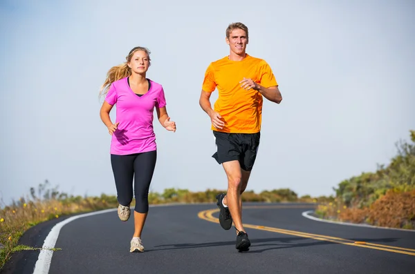 Fitness sport couple running jogging outside