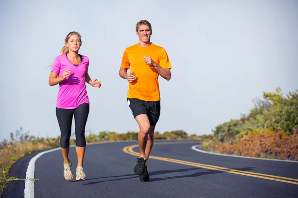 Fitness sport couple running jogging outside — Stock Photo #35184059