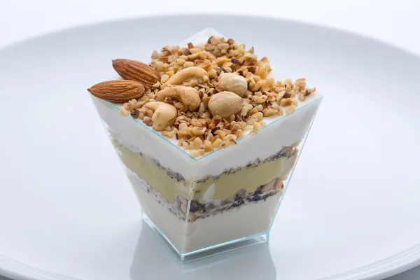 Frozen yogurt cake with nuts