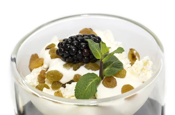 Semolina porridge with berries decorated with berry jam