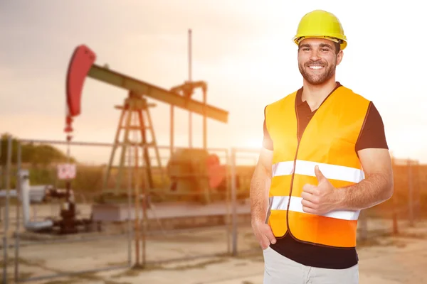 Refinery worker reads the data from the black plates