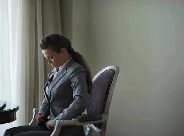 Business woman in hotel room. Business trip