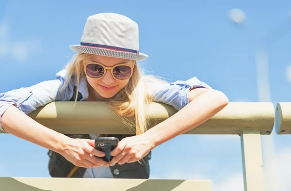 Hipster girl with cell phone