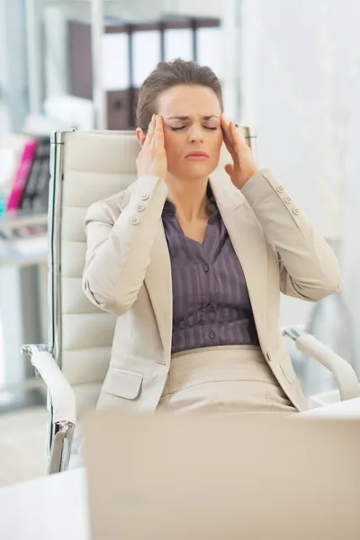 Business woman with headache