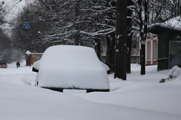 Snow covered car