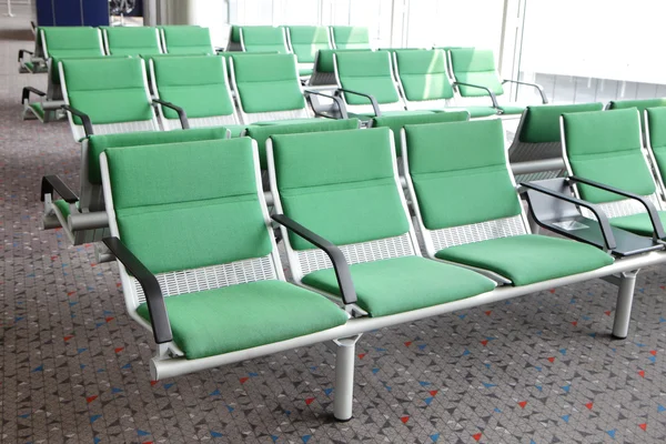 Row of purple chair at airport
