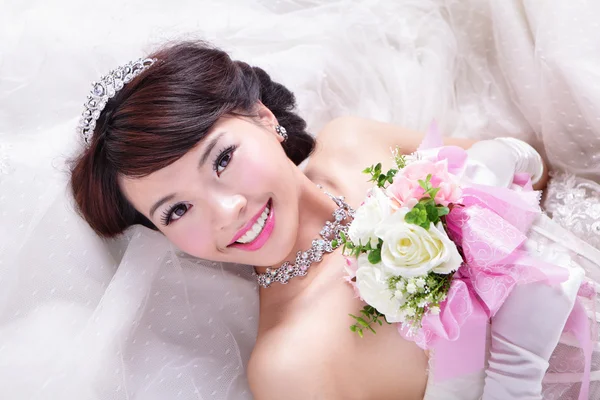 Beauty portrait of bride with roses