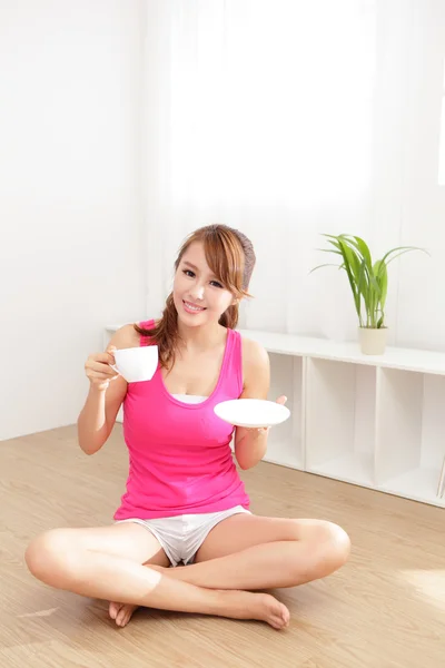 Young Woman drinking coffee