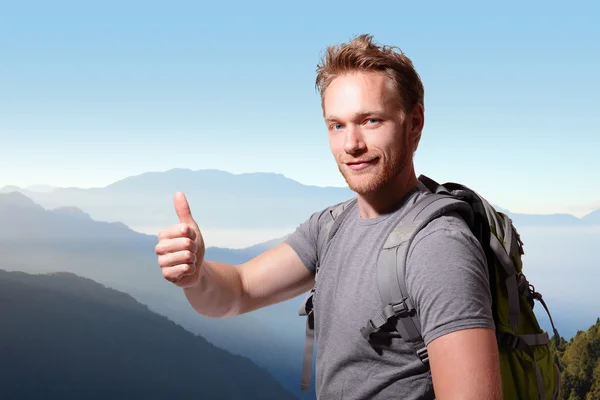 Happy man mountain hiker