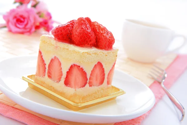 Sweet cake with strawberry at tea time