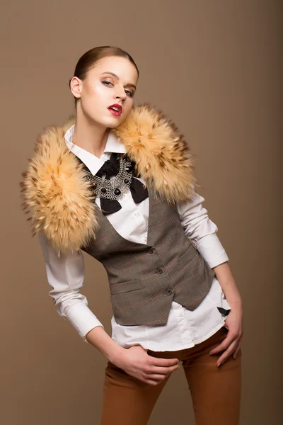 Portrait of Perfect Arrogant Woman in Grey Waistcoat and Fur Collar