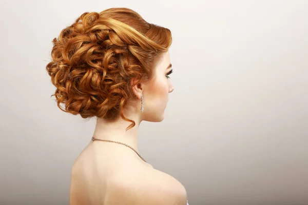 Styling. Rear View of Frizzy Red Hair Woman. Haircare Spa Salon Concept