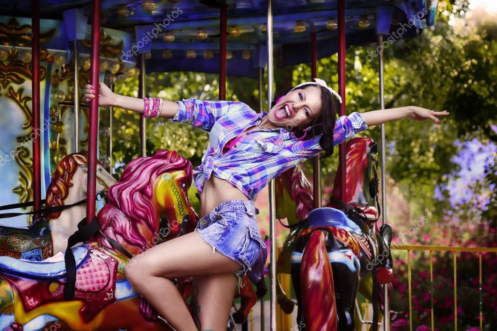 http://st.depositphotos.com/1387882/3081/i/950/depositphotos_30817157-stock-photo-funfair-cheerful-woman-in-amusement.jpg