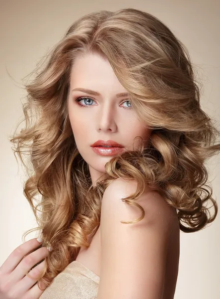 Sophisticated Woman with Perfect Skin and Flowing Blond Healthy Hair