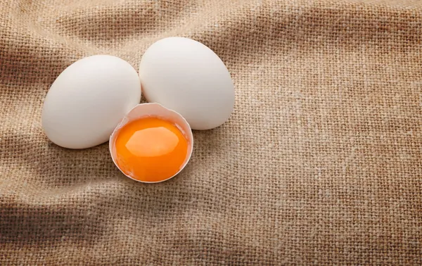 Eggs on burlap background