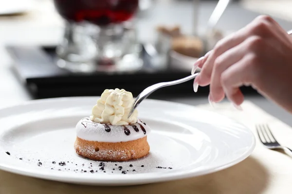 Sweet cake on white dish