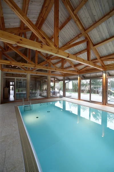Interior of swimming pool inside of house