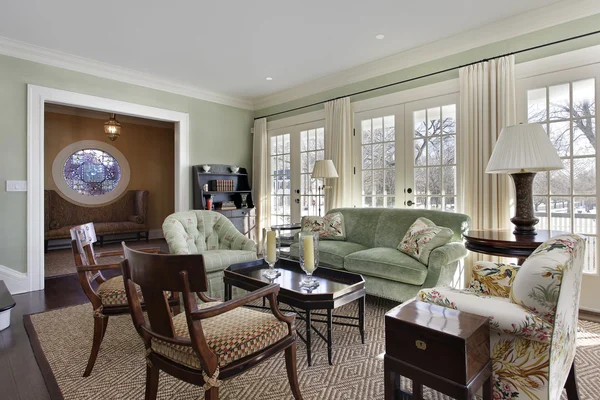 Living room with doors to deck