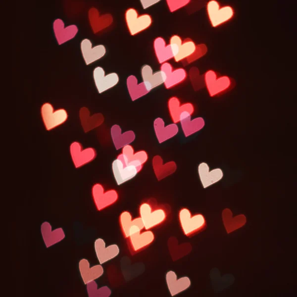 Hearts Bokeh in dark. Valentines Day Card