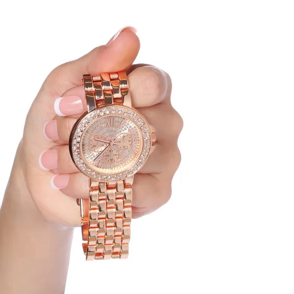 Gold Wrist Watches with Diamonds in Female Hand isolated