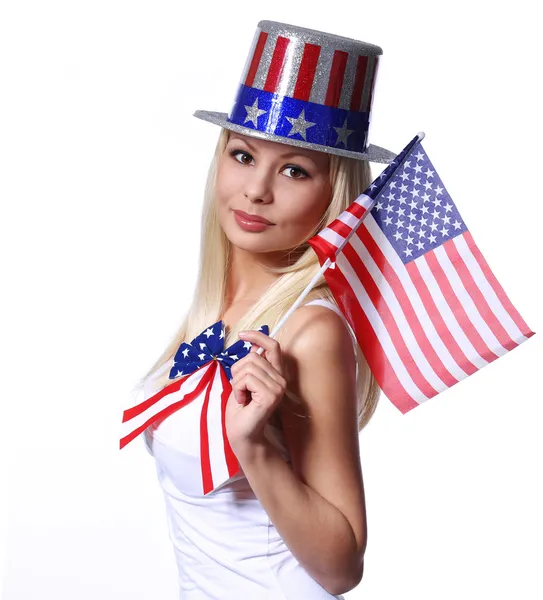 Blonde Girl waving Small American Flag isolated on white
