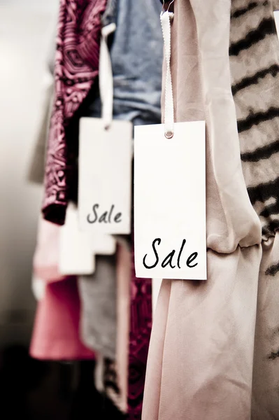 Boutique clothing rack with Sale tag