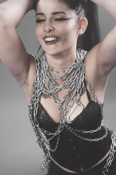 Woman with big silver chains