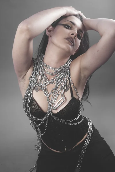 Woman with big silver chains