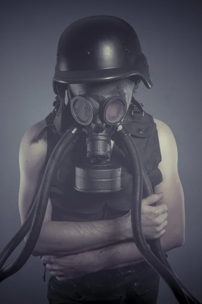 Man with black gas mask
