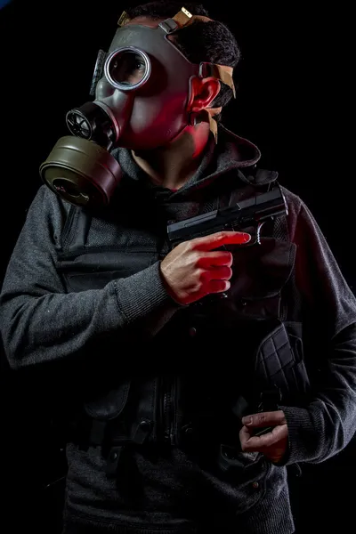 Private detective with gas mask