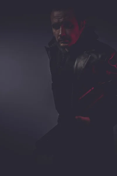 Man with long leather jacket