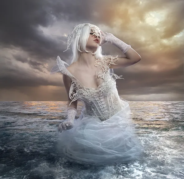 Blonde woman in sea
