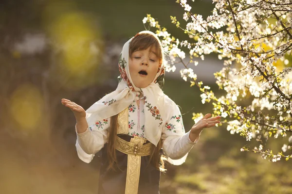 Little girl in Russian traditional dress