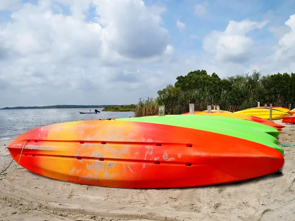 Colorful Kayaks on Beach