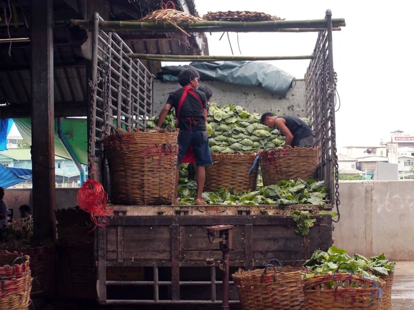BANGKOK, THAILAND - SEPTEMBER 8: fresh vegetables stall pick up in the car for selling on September 8, 2012 in Bangkok, Thailand