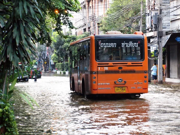BANGKOK, THAILAND - OCTOBER 30 : Heavy flooding from monsoon rain in Ayutthaya and north Thailand arriving in Bangkok on October 30,2011 Bangkok, Thailand