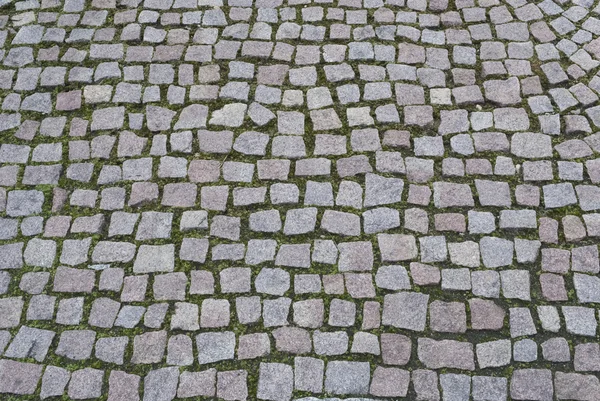 Background image of old cobblestone road
