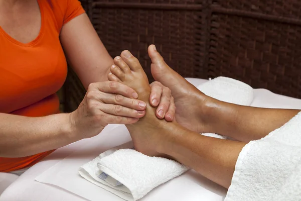 Professional relaxing foot massage, various techniques