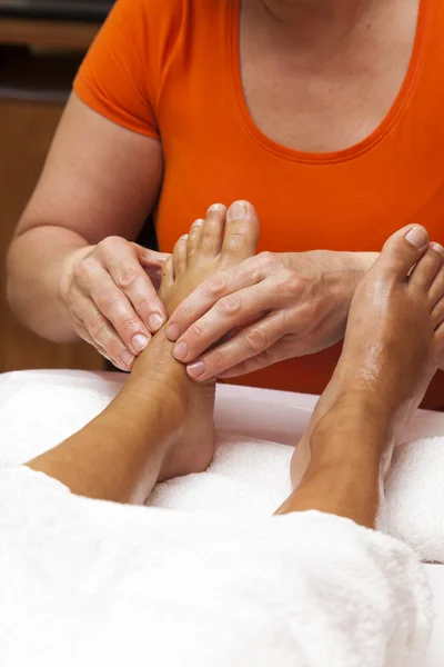 Professional relaxing foot massage, various techniques
