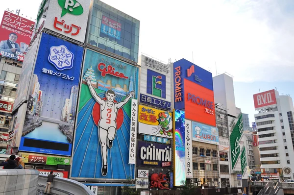 OSAKA, JAPAN - OCT 23: The Glico Man Running billboard and other