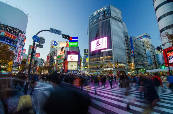 TOKYO - NOVEMBER 28, 2013: Pedestrians at the famed crossing of Shibuya district