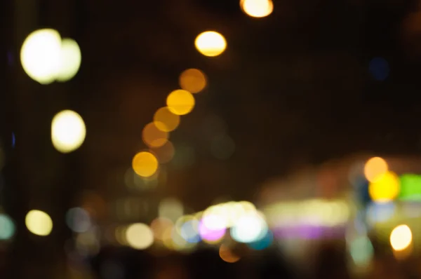 Out of focus lights in a main street.