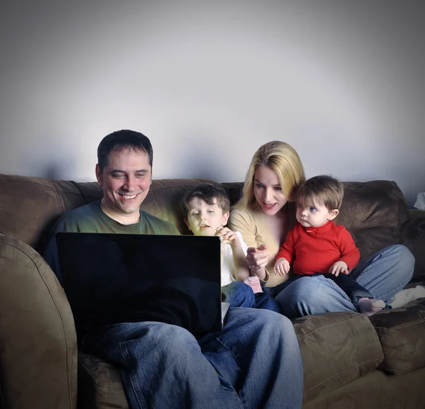 Technology Family at Home on Laptop