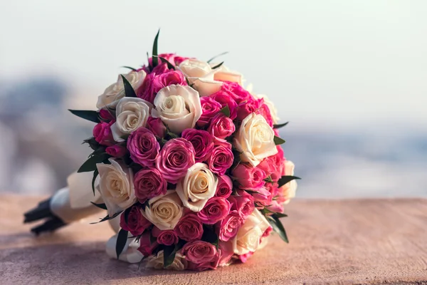 Wedding bouquet of red white roses
