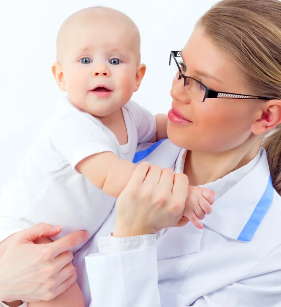 Woman doctor with tiny baby