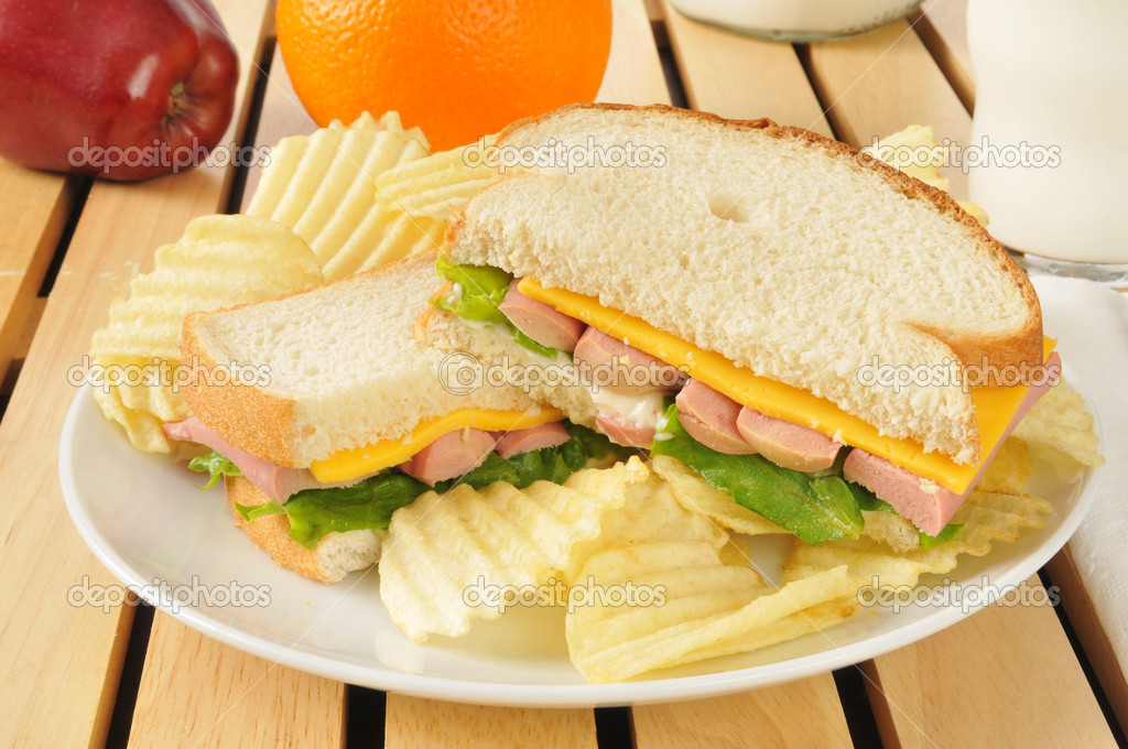 Vienna sausage sandwich with potato chips — Stock Photo