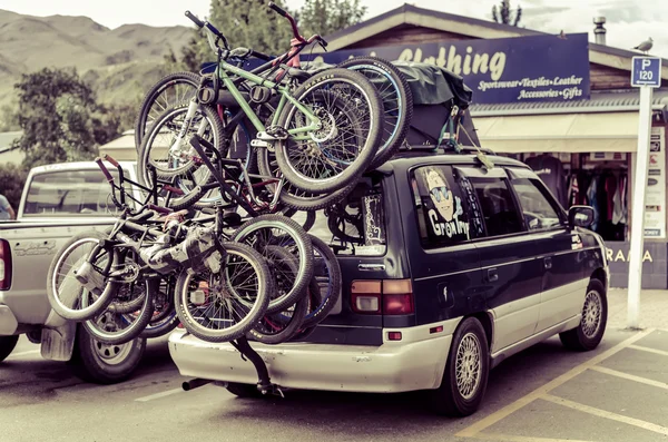 Bikes Loaded on the Back of a Car