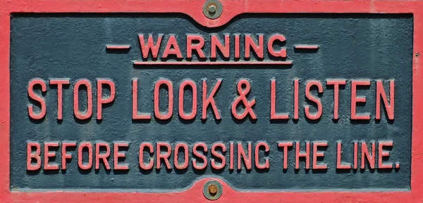 Warning stop look listen sign